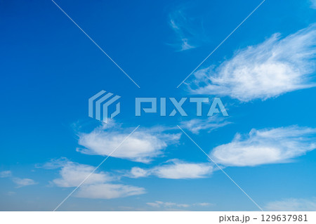 Bright Blue Sky with White Clouds over Esna Lock Nile Egypt. 129637981