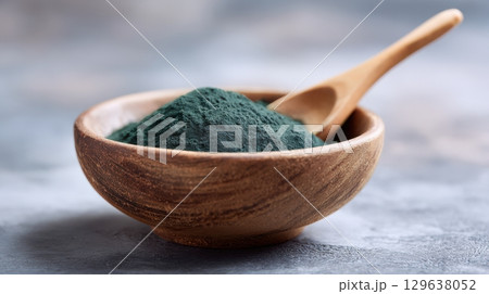 Minimal close-up of superfood supplement styled natural for clean lifestyle visuals 129638052