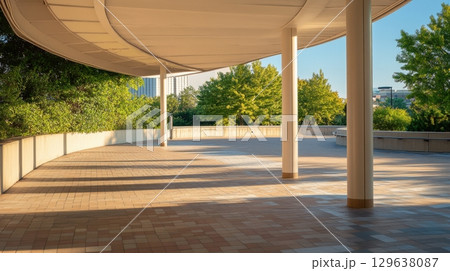 Artistic bus stop with curved canopy and terrazzo flooring styled in minimal tones for modern urban spaces 129638087