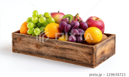 Rustic wooden box with fresh apples, grapes, oranges and kiwis isolated on white background 129638721