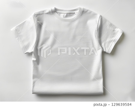 Plain White T-Shirt Laid Flat on White Background 129639584