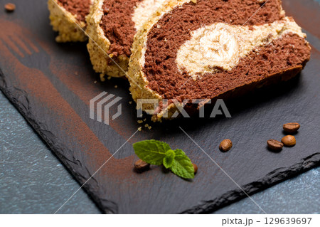 Chocolate roll with banana Chocolate roll with banana 129639697