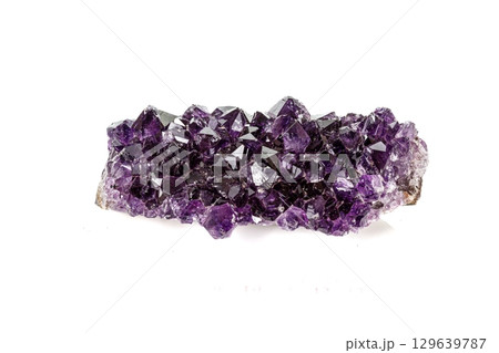Amethyst Crystal Druse macro mineral on white background Amethyst Crystal Druse macro mineral on white background 129639787