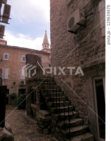 Exploring the Serene Stone Alleyways of Budva in the Enchanting Old City of Montenegro 129639876