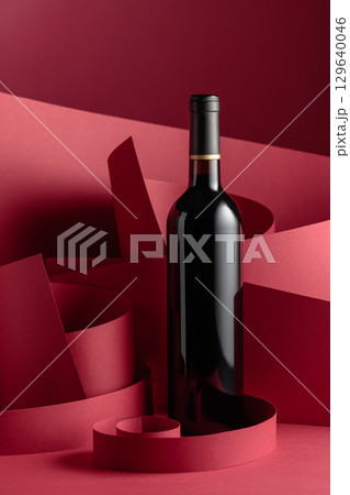 Bottle of red wine. 129640046