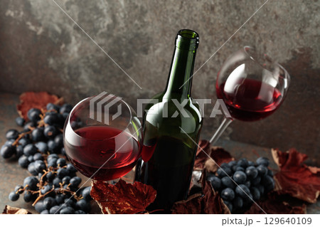 Red wine and blue grapes. Red wine and blue grapes. 129640109