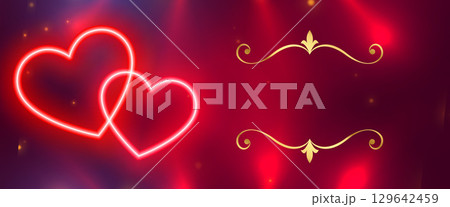 glowing neon heart on shiny banner with text space glowing neon heart on shiny banner with text space 129642459