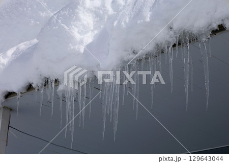 Icicles stone wall. High quality photo 129643044
