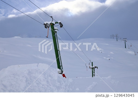 Ski lift snow vastness, fabulous, winter holiday. High quality photo Ski lift snow vastness, fabulous, winter holiday. High quality photo 129643045
