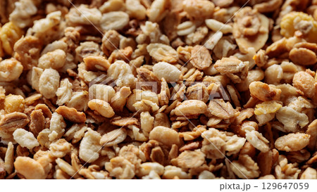 Granola Oat Flakes and Cereal Clusters Healthy Snack Close-Up Granola Oat Flakes and Cereal Clusters Healthy Snack Close-Up 129647059