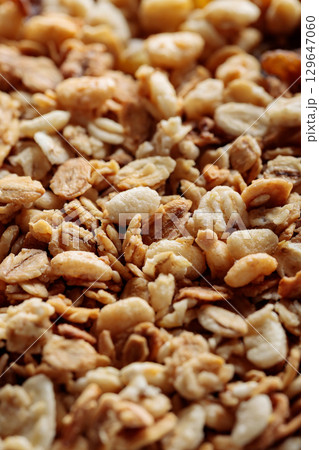 Granola Oat Flakes and Cereal Clusters Healthy Snack Close-Up 129647060
