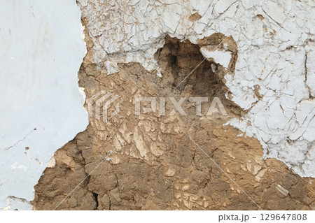 Damaged Rural House Mud wall Texture 129647808