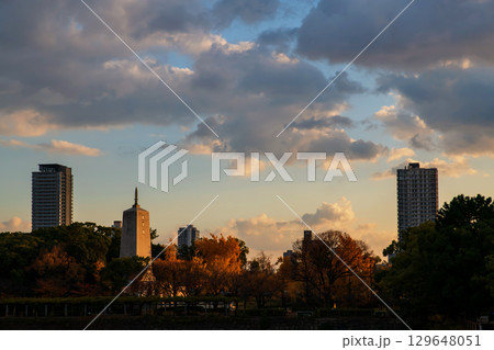 Kyoikuto Education Tower and Osaka city at sunset in fall colors 129648051
