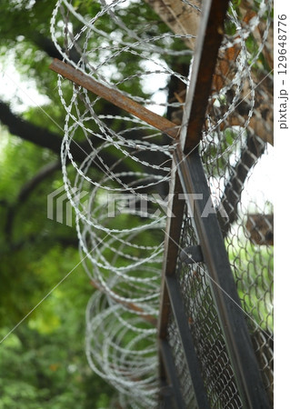 Abstract Metal Fence at Jail wall Abstract Metal Fence at Jail wall 129648776