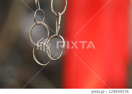 Metal Rings Hanging in a shop Metal Rings Hanging in a shop 129649256