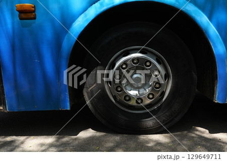 Bus Running on city Road 129649711