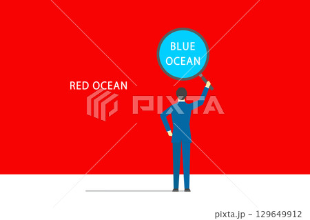 虫眼鏡を使ってレッドオーシャンからブルーオーシャンを見つけるビジネスマン 129649912