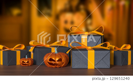 The Pumpkin and gift box for Halloween orHoliday concept 3d Rendering. The Pumpkin and gift box for Halloween orHoliday concept 3d Rendering. 129651240