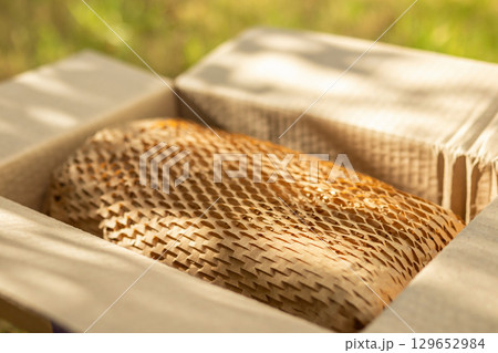 Eco friendly brown paper honeycomb wrap for product packaging parcel carton box 129652984