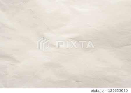 Abstract white crumpled and creased recycle paper texture background 129653059