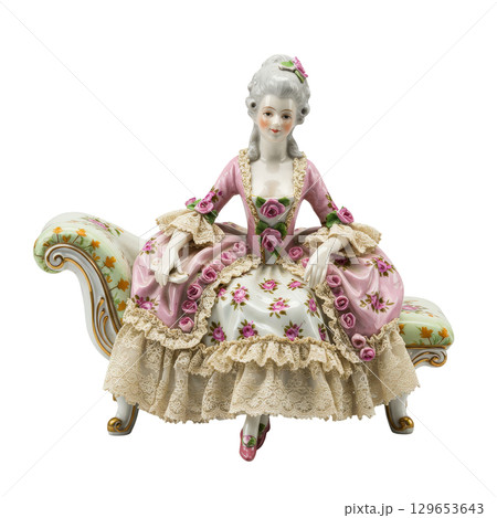 Elegant porcelain figurine of a rococo lady in a pink dress a classic vintage home decoration 129653643