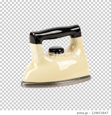 Vintage beige ceramic iron with a black handle and a classic retro design for home decor 129653647
