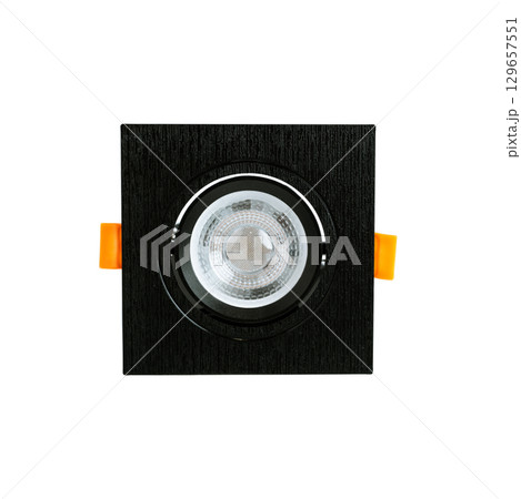 Black recessed ceiling light fixture with MR16 GU5.3 bi-pin socket, ceramic holder and orange mounting clips, isolated on white background. Black recessed ceiling light fixture with MR16 GU5.3 bi-pin socket, ceramic holder and orange mounting clips, isolated on white background. 129657551