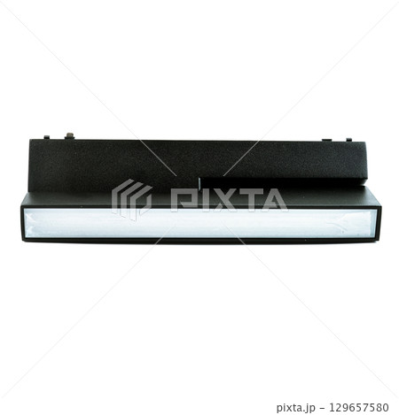Black rectangular ceiling spotlight lying horizontally, isolated on white background, stylish fixture for modern interiors and lighting projects. 129657580