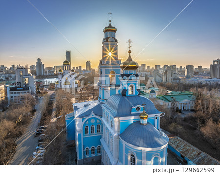 Spring or Autumn Yekaterinburg, Temple of the Ascension and Temple on Blood in beautiful clear sunset. Spring or Autumn Yekaterinburg, Temple of the Ascension and Temple on Blood in beautiful clear sunset. 129662599