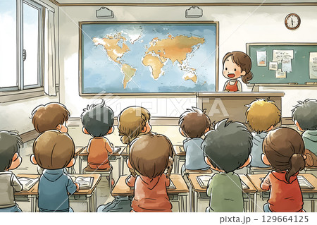 子どもたちが壁にかかる大きな世界地図を見ながら学ぶ授業 129664125
