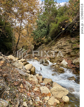 mountain river fast for waterfall rapids stream autumn. High quality photo 129664418