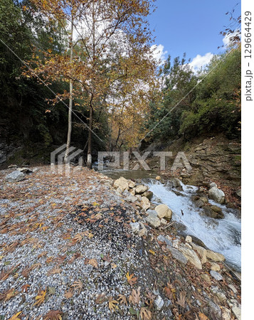 mountain river fast for waterfall rapids stream autumn. High quality photo mountain river fast for waterfall rapids stream autumn. High quality photo 129664429