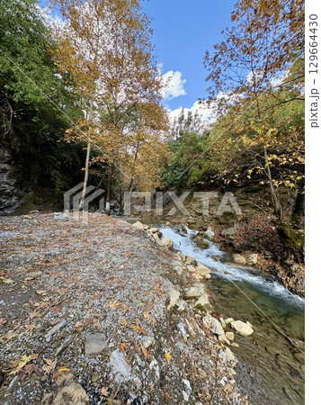 mountain river fast for waterfall rapids stream autumn. High quality photo mountain river fast for waterfall rapids stream autumn. High quality photo 129664430