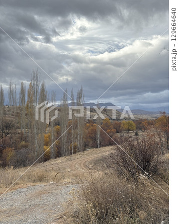 mountains late autumn cloudy postcards background. High quality photo mountains late autumn cloudy postcards background. High quality photo 129664640
