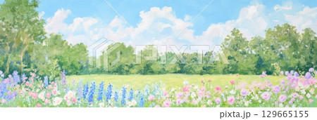 Beautiful summer landscape with wildflowers, meadow, trees and bright blue sky with clouds 129665155