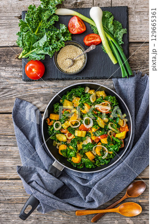 zucchini kale tomato saute sprinkled with sesame zucchini kale tomato saute sprinkled with sesame 129665361
