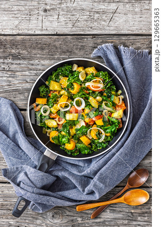 zucchini kale tomato saute sprinkled with sesame zucchini kale tomato saute sprinkled with sesame 129665363