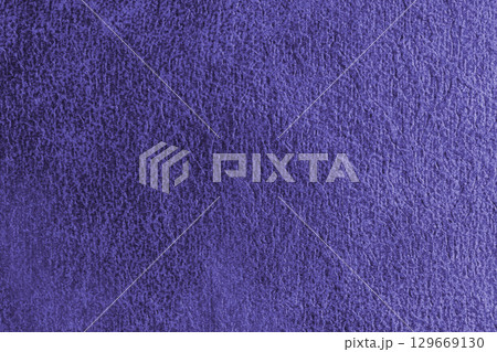 Close up, macro structure of purple suede fabric with abstract embossed shabby, messy texture. 129669130
