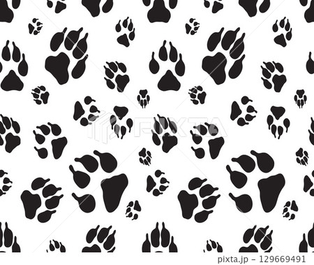 Black silhouettes of prints of dog paws, Seamless pattern 129669491