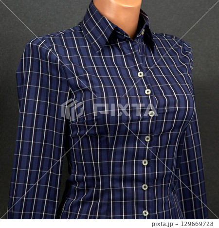 Stylish blue plaid button-up shirt for professional casual looks at the office or events 129669728