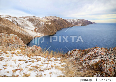 Lake Baikal, Aya Bay in December. Open water in the lake. 129675751