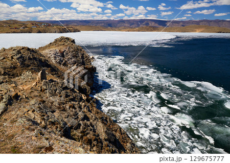 Spring landscape of Lake Baikal on a sunny May day 129675777