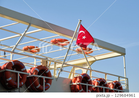 Turkish Flag on Ship with Life buoys 129684961