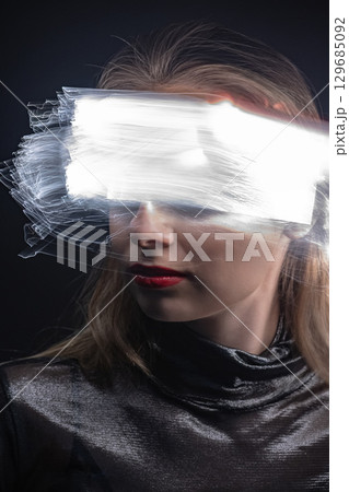 Abstract woman studio portrait with light painting technique 129685092