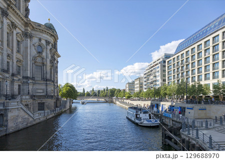 Berlin, Germany - July 01, 2018: View of the river Spree and the embankment of Berlin. 129688970