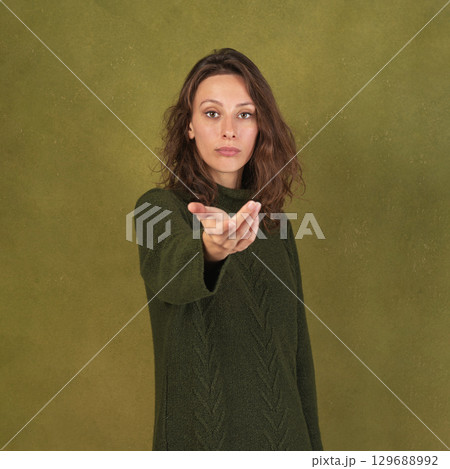 Beautiful Woman Reaching and to Camera Beautiful Woman Reaching and to Camera 129688992
