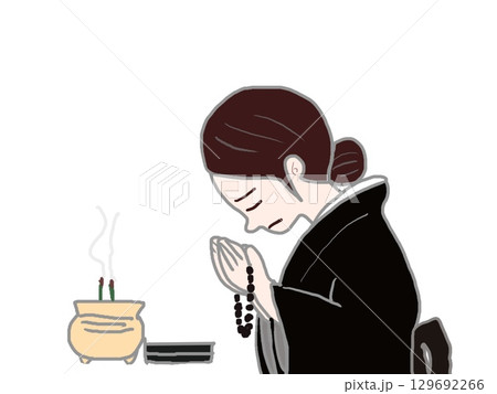 焼香をする喪服を着て合掌をする女性の横顔のイラスト 焼香をする喪服を着て合掌をする女性の横顔のイラスト 129692266