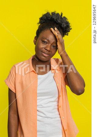 Sad young woman loses becoming surprised by lottery results bad fortune loss unlucky fortune news 129695647