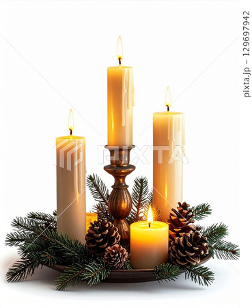 Three Ivory Candles with Pine Sprigs and Pinecones Decoration on White Background 129697942