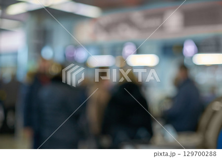 Blurry crowd in busy indoor setting with diverse adults Blurry crowd in busy indoor setting with diverse adults 129700288